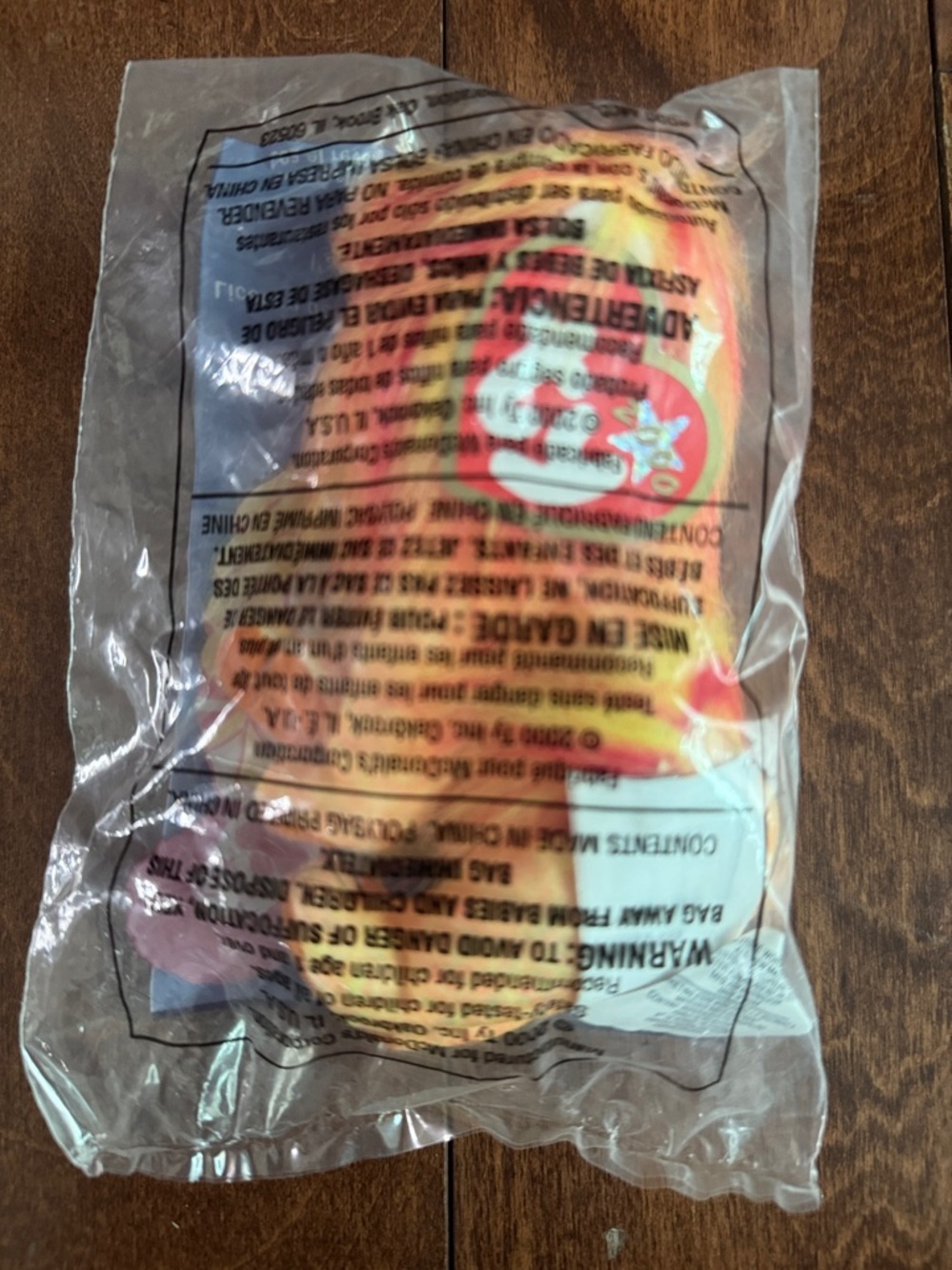 "Ty Teenie Beanie Baby" in original packaging. "Bushy" the Lion. Rare